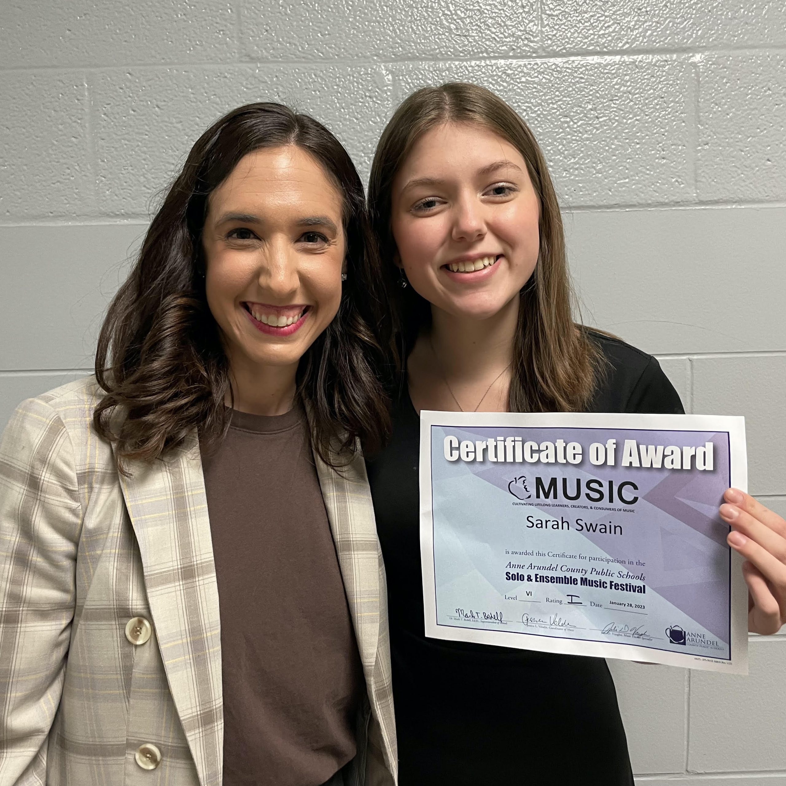 Jamie Levine with a vocal music student who took lessons from her for years