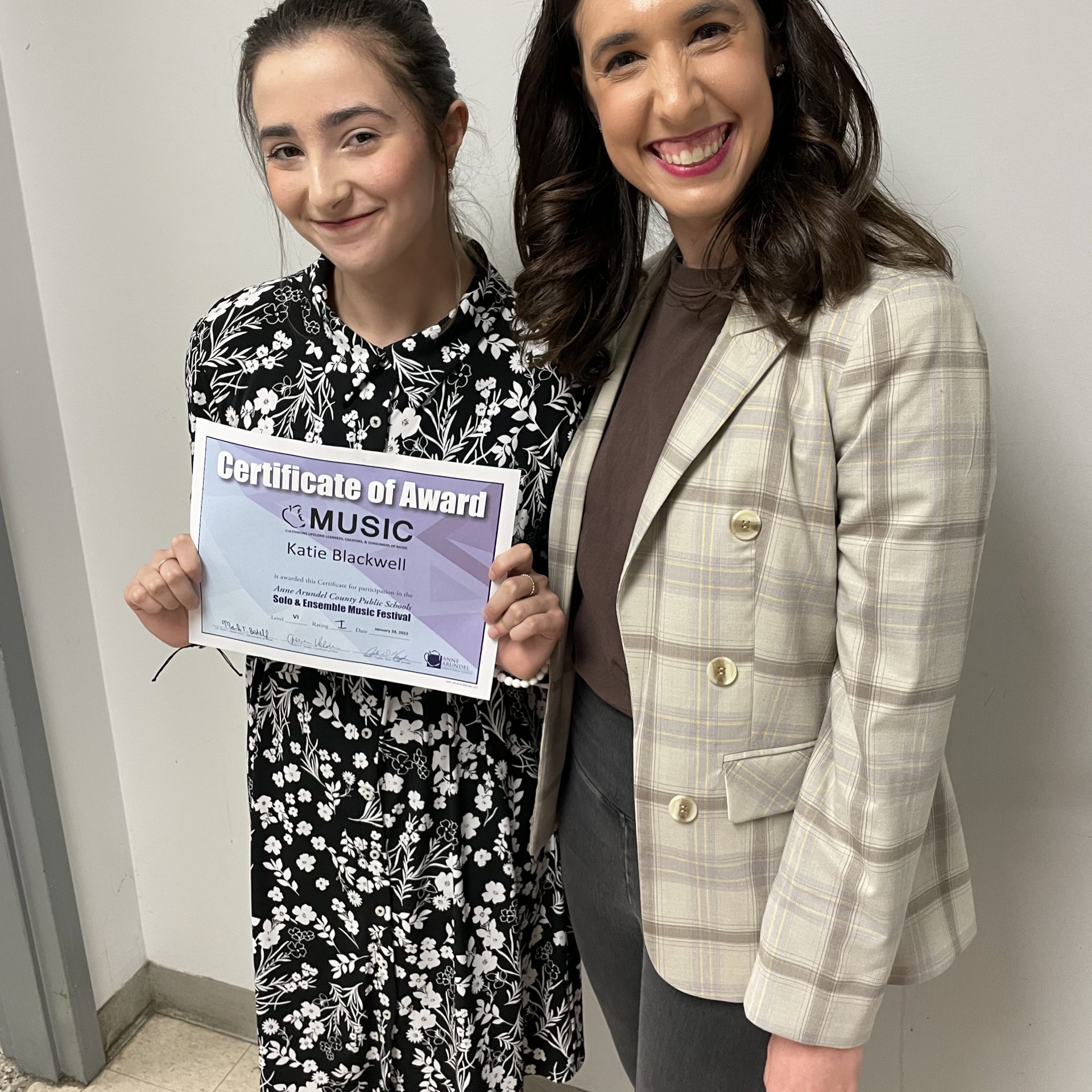 Jamie with a girl who took vocal music lessons with her, after she won an award at the solo and ensemble music festival